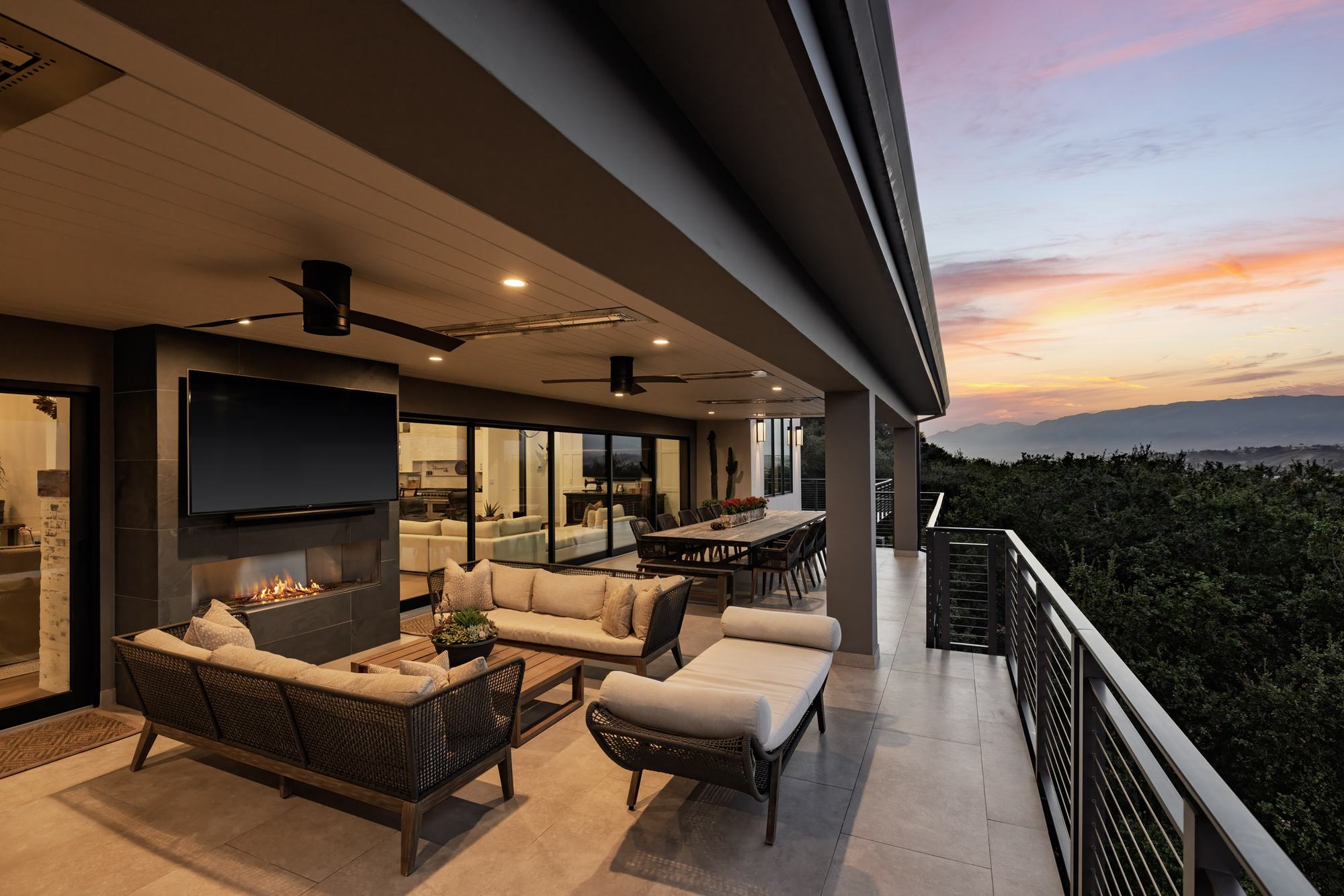 Covered terrace lounge with fireplace