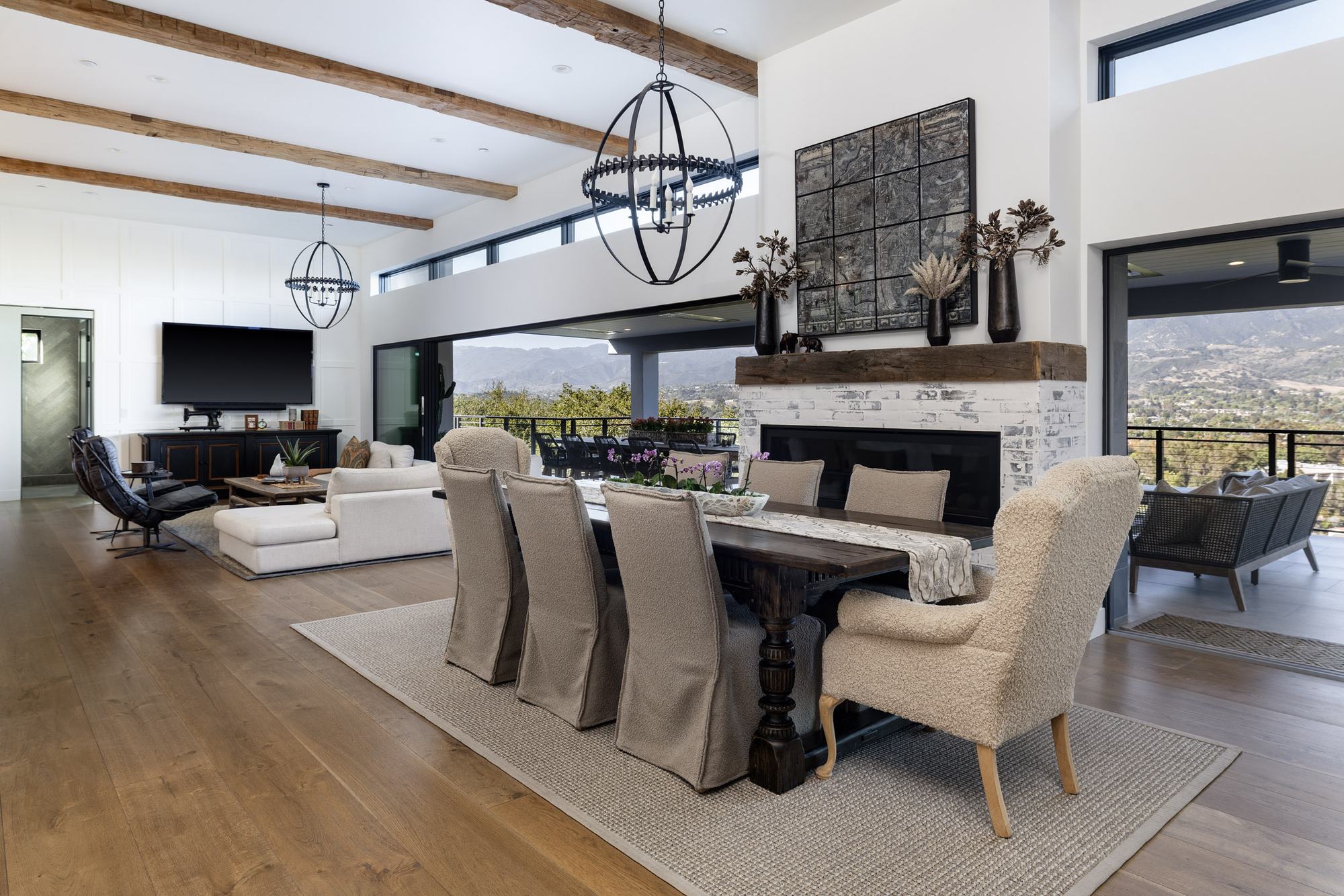 Great room with fireplace and beamed ceilings